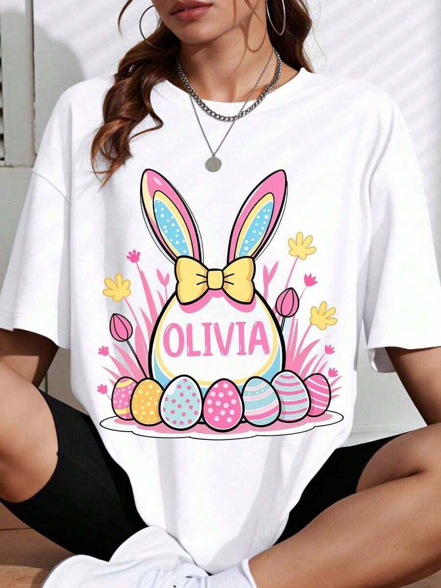 1 White Easter Bunny T-Shirt With Personalized Name Olivia, With Colorful Eggs And Flowers, Spring Holiday Clothes, 180g, 100% Cotton. - 白色 - 查看 1