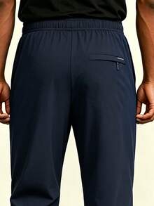 AHTELB Men's Summer Thin Ice Silk 3/4 Pants, Loose Straight Casual Mid-Length Trousers, Elastic Waist Drawstring Design Sports - Navy Blue - View 5