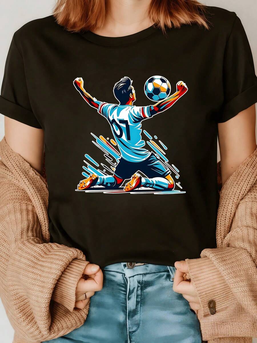 Player Celebrating The Moment Of Triumph With Passion And Energy, Holding The Ball While Kneeling, Evoking Strength, Determination, And Joy. Comfortable, Modern Women's T-Shirt For Football Fans. - 黑色 - 查看 1