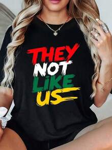 A Message Expressing Pride And Difference With Bold Lettering In Red, Green, Yellow, And White, Symbolizing Identity And Inner Strength. Women's T-Shirt, 100% Cotton, Comfortable And Modern. - Black - View 1