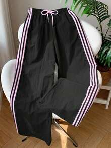 Pantalones de chándal casuales y holgados con cintura elástica y rayas laterales marrones para mujer - Negro - Ver 4
