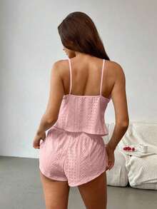 El traje de encaje negro de la señora es tanto romántico como sexy.Es adecuado para fiestas y también se puede usar para combinaciones de ropa de temporada.Combina materiales de punto y encaje y tiene un lazo en la cintura.Este es un conjunto de - Rosa - Ver 2