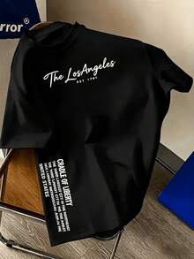Black Short-Sleeved T-Shirt With A Graphic Print Of The Historical Typography "Los Angeles EST 1781 Cradle Of Liberty", Urban Style, Casual, Everyday Wear, Loose Fit, Comfortable, Ideal As A Gift . - 黑色 - 查看 1