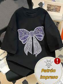 Women's T-Shirt With A Large, Shiny Bow Print, Featuring A Purple Sequined Top And Translucent White Ribbons, In A Sweet And Decorative Style. - Black - View 1