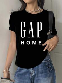 Palabra central que simboliza un espacio de calma y pertenencia con letras grandes que evocan equilibrio y serenidad camiseta de mujer casual cómoda moderna para uso diario - Negro - Ver 1