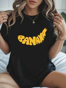 Nueva Camiseta de Moda para Mujer con Cuello Redondo y Estampado Divertido de Plátano, estilo casual, diseño básico universal, versátil y listo para el verano. - Negro - Ver 1