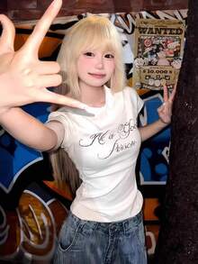Tシャツ レディース 半袖 タイト ショート丈 クロップド丈 トップス ラインストーン ロゴ 英字 ビジュー カットソー 黒 ブラック ギャル Y2K ストリート系 韓国 ファッション セクシー 着痩せ 細見え 腹出し クルーネック 丸首 ライブ フェス イベント クラブ 衣装 派手 華やか ストレッチ 伸縮性 夏服 カジュアル 大人可愛い ヘソ出し ダンス 10代 20代 春夏 スポーティー クール きれいめ 細身 ボディコン スリム フィット ボディライン 美シルエット シワになりにくい アメカジ コンパクト ベーシック ティーシャツ 夏 - ホワイト - チェックする 4
