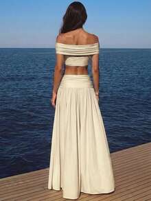 Perirose Conjunto feminino elegante bege de duas peças com top cropped torcido ombro a ombro e calça pantalona, modelo sem mangas, perfeito para resorts e para um look sexy de praia. - Luz amarela - Ver 2