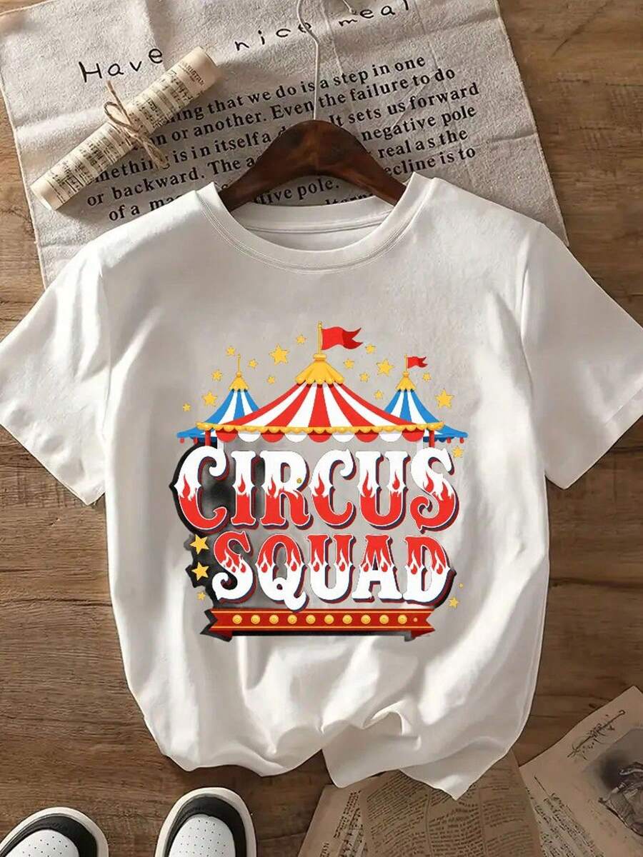 T-Shirt | Colorful Circus Design, Tent With Red/White/Blue Stripes, Yellow Stars, Large 'CIRCUS SQUAD' Font | 220g Weight Fabric, Comfortable Material, Unisex Casual Wear, Perfect Gift, Circus T-Shirt Displayed On A Wooden Hanger, Ideal For Matching Family Outfits, Great For Family Parties And Holidays, Everyday Wear, Summer Outfit, Outdoor Play And Holiday Wear, Warm Weather Clothing, Perfect For Daily Use And As A Gift. - 白色 - 查看 1