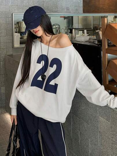 撞色学院风沙滩新款休闲宽松印花不对称领口女式卫衣