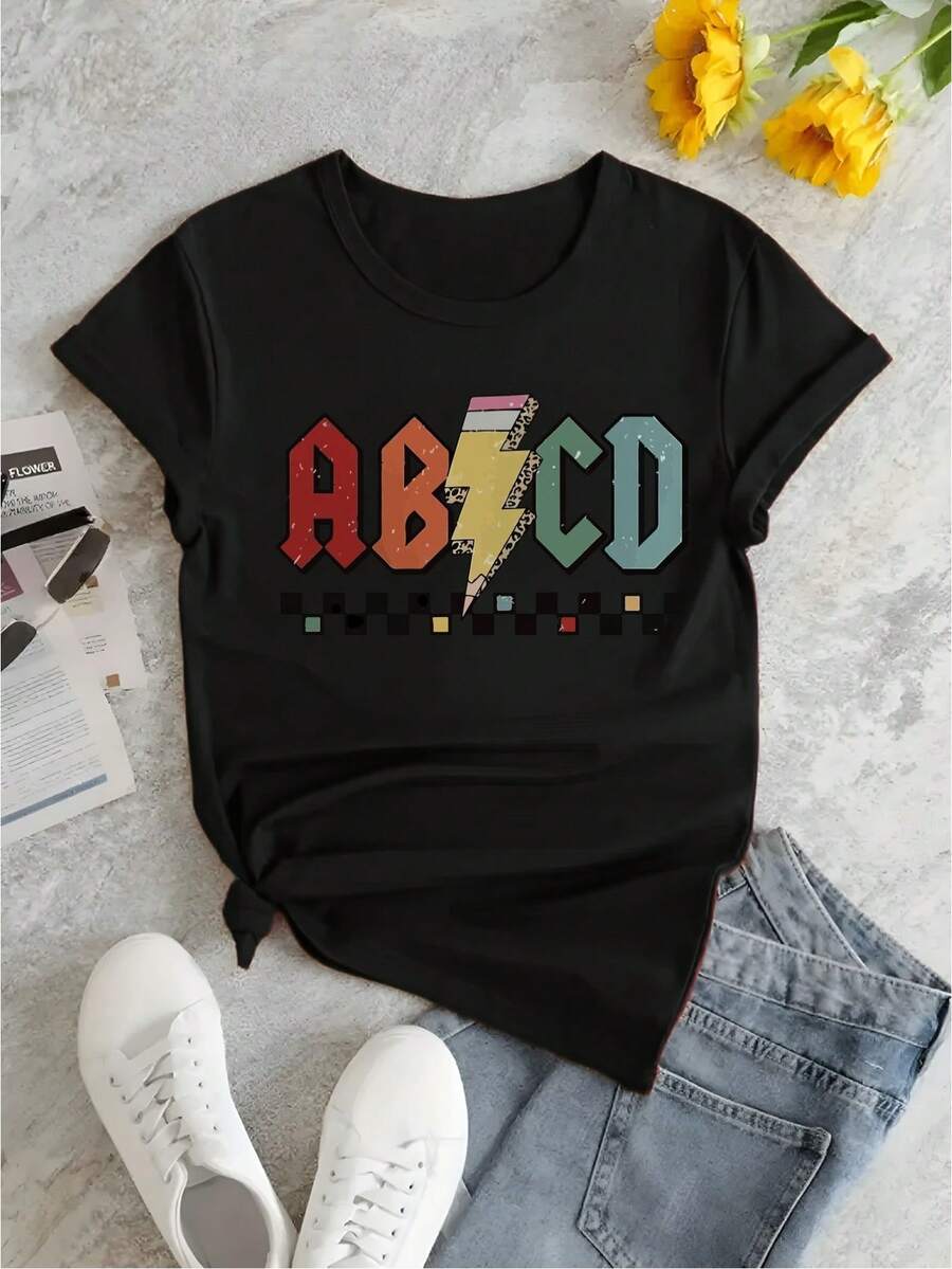 Camiseta Gráfica Retro de los Años 80 para Mujeres de Talla Grande - Camiseta Negra de Cuello Redondo y Manga Corta con Estampado de Letras Multicolor, Ligera y Transpirable para Fiestas Temáticas de los Años 80 y Uso Casual, Estampado Vibrante de Letras ABCD, Corte Relajado, Lavable a Máquina, Tallas S-3XL, 100%. - Negro - Ver 1