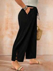 Pantalones de talla grande en color liso y con textura casual - Negro - Ver 1