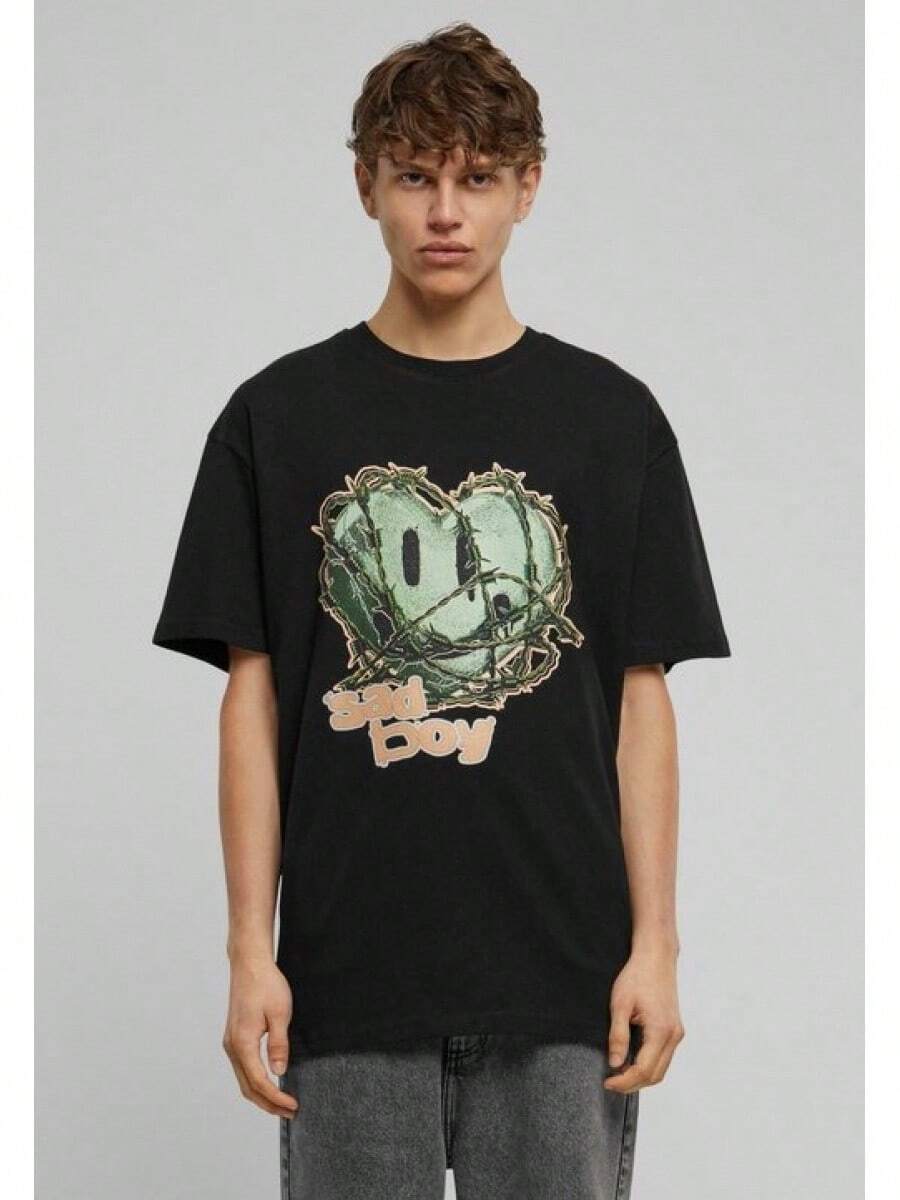 Unisex Short-Sleeve T-Shirt,Schwarzes Baumwoll-T-Shirt mit einem grafischen Design eines gr￼nen -Gesichts, das mit Stacheldraht umwunden ist, und den Worten "sad boy" in hellbeige., Weiche Baumwolle, Lässige Alltagskleidung, Baumwoll-T-Shirt, Sommer, Y2K-Stil, , Vatertag, 2000er-Stil, Sommer-Oberteile, Leichtgewicht, Atmungsaktiver Stoff, Outdoor-Spaß, Reisen & Ausflüge, Festival-Stil, Weich & Leicht, Sommerurlaub, Freizeitkleidung - Schwarz - Übersicht 1