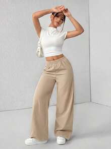 Pantalones de pierna de campana con cintura alta, elásticos y acanalados para mujeres - Caqui - Ver 4