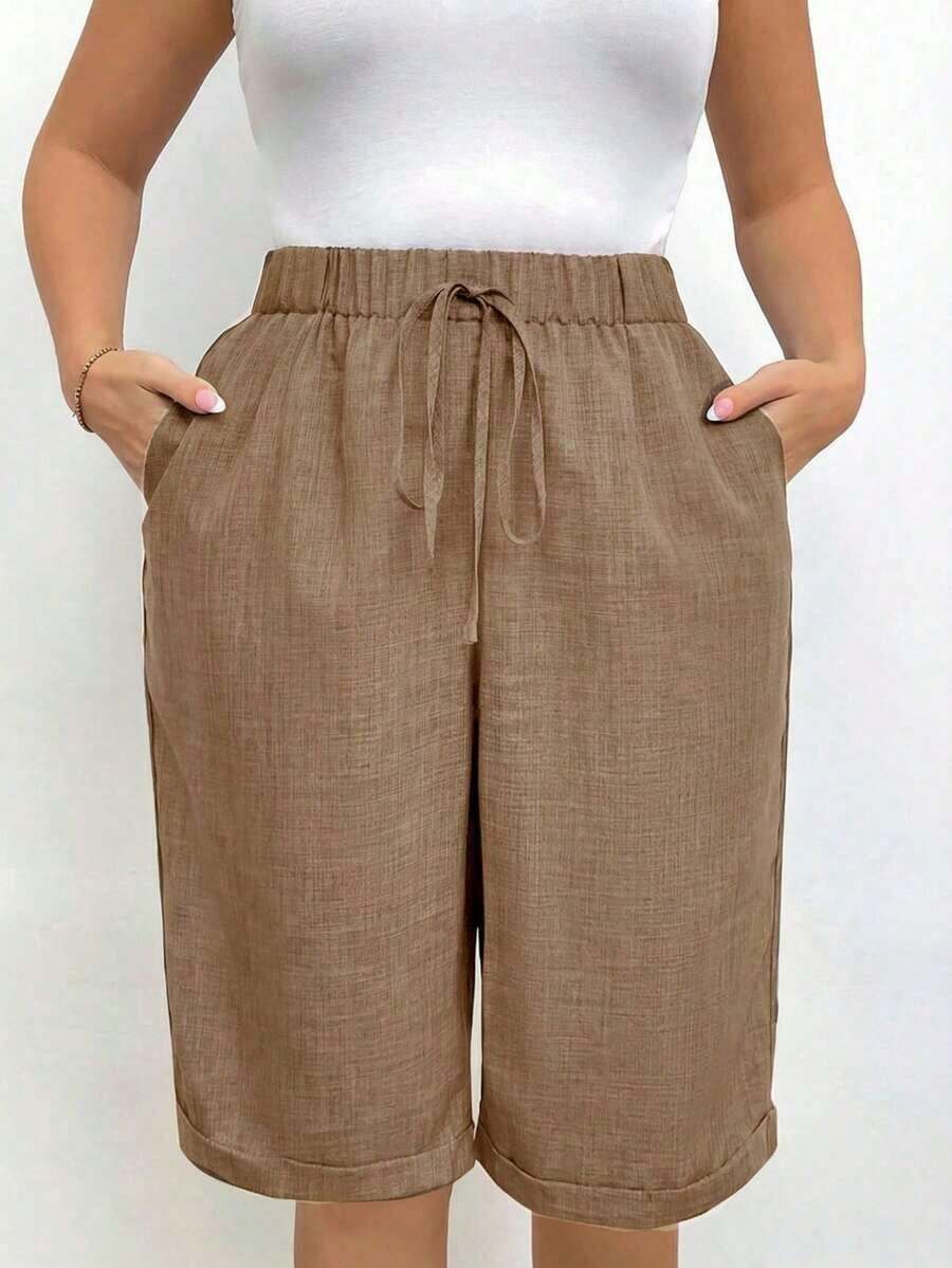 Pantalones cortos holgados de lino de talla grande para mujer, de unicolor, con bolsillo y lazo en la cintura, pantalones cortos anchos y de pierna ancha, pantalones cortos modestos para vacaciones y verano, color negro - Caqui - Ver 1