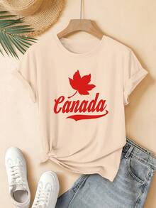 Camiseta casual esencial de manga corta con cuello redondo para mujer joven, con estampado de hoja de arce canadiense y letras rojas, moderna y linda, lavable a máquina, adecuada para el estilo casual de calle de uso diario, una excelente opción para regalos, ideal para el hogar, la oficina y otras ocasiones. Algodón Suave para Uso Diario en Verano - Albaricoque - Ver 1