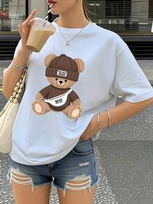 Camiseta de manga corta con cuello redondo y estampado de oso marrón para mujer, estilo casual y versátil para primavera y verano, ideal para uso diario y urbano. - Blanco - Ver 1