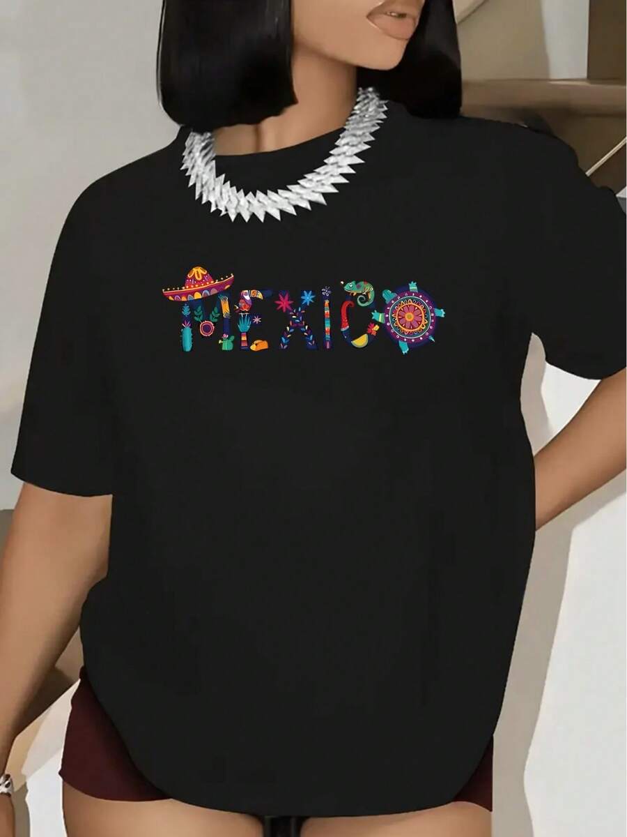 Camiseta de algodón puro para mujer, una camiseta deportiva casual con un vibrante diseño mexicano y coloridos motivos de sombreros y sol mexicanos, de corte holgado y estilo básico, perfecta para uso diario o para viajes. - Negro - Ver 1