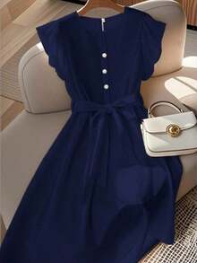 Vestido de mujer de longitud media, cómodo y suave, sin estiramiento, con cuello redondo, mangas de vuelo, cintura elástica, decoración de botones de perla, estilo francés elegante y versátil para vacaciones y viajes, color albaricoque, primavera - Azul marino - Ver 8