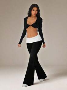Pantalones acampanados con cintura plegable de color contrastante para mujer - Negro - Ver 6