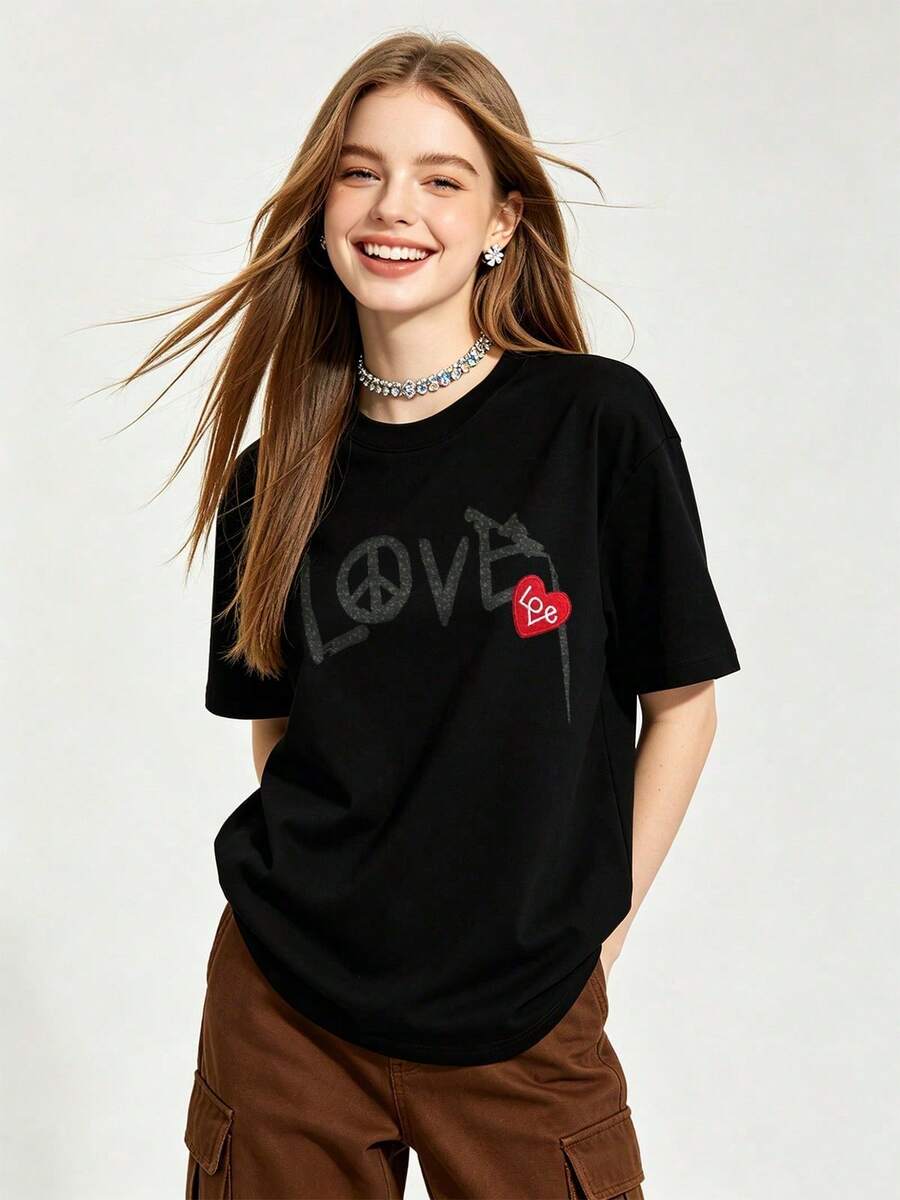 Camiseta de manga corta con cuello redondo suave y casual para mujer de verano |   Amor | Tops para salir, Estilo callejero europeo y americano, Casual deportivo, Estilo unisex, Estilo casual urbano, Tops bonitos, Generación Z, Curvas, Ropa Y2K, Camisetas divertidas, Tops de mujer, Conjuntos de vacaciones para mujer, Top lindo, Camiseta gráfica, Conjuntos de primavera, Camisetas holgadas, Ropa urbana retro, Estilo de los 90, Estilo de los 2000, Subcultura, Top negro, Tops blancos, Conjunto de fiesta de los 90. - Negro - Ver 1
