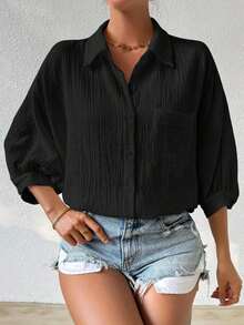 Camisa de mujer minimalista y casual de unicolor con botones delanteros, textura y hombros caídos - Negro - Ver 3