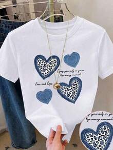 Camiseta de cuello redondo y mangas cortas de ropa fashion, fabricada en México, para la temporada primavera-verano 2026.Con estampado de dibujos animados, es un modelo de pareja, apta para usar tanto por dentro como por fuera, ideal para oficina y estilo casual, diseñada para hombres y mujeres, en unidad individual. - Blanco - Ver 2