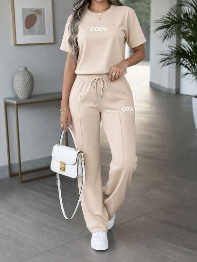 2 Stücke Damen Sommer Set, personalisierter Buchstaben-Muster Rundhals Kurzarm T-Shirt kombiniert mit hochgeschnittener Taille Kordelzug Gerade Bein Hose, elegant