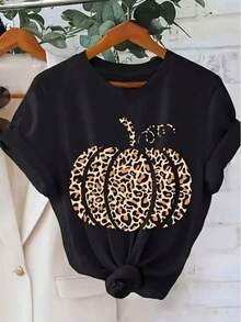 Camiseta de Halloween para Mujeres con Estampado de Leopardo y Calabaza - Negra y Casual para el Día a Día y Fiesta de Halloween - Tela Mediana Elástica No Transparente - Lavable a Máquina Ropa de Fiesta de Otoño, Ropa de Halloween, Camiseta Gráfica Festiva, Diseño Festivo Juguetón Mujer camiseta casual estampado calabaza animal print ajuste holgado cuello redondo manga corta verano uso diario - Negro - Ver 6