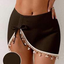 Falda de punto negra para cubrir el bikini con decoración de conchas y estrellas de mar, con abertura sexy. - Blanco - Ver 5