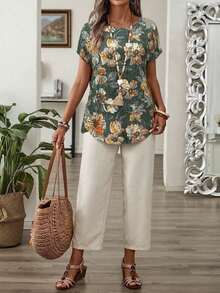 Conjunto de dos piezas para vacaciones casuales para mujeres con blusa con mangas murciélago estampada con flores y pantalones largos de unicolor - Verde - Ver 1
