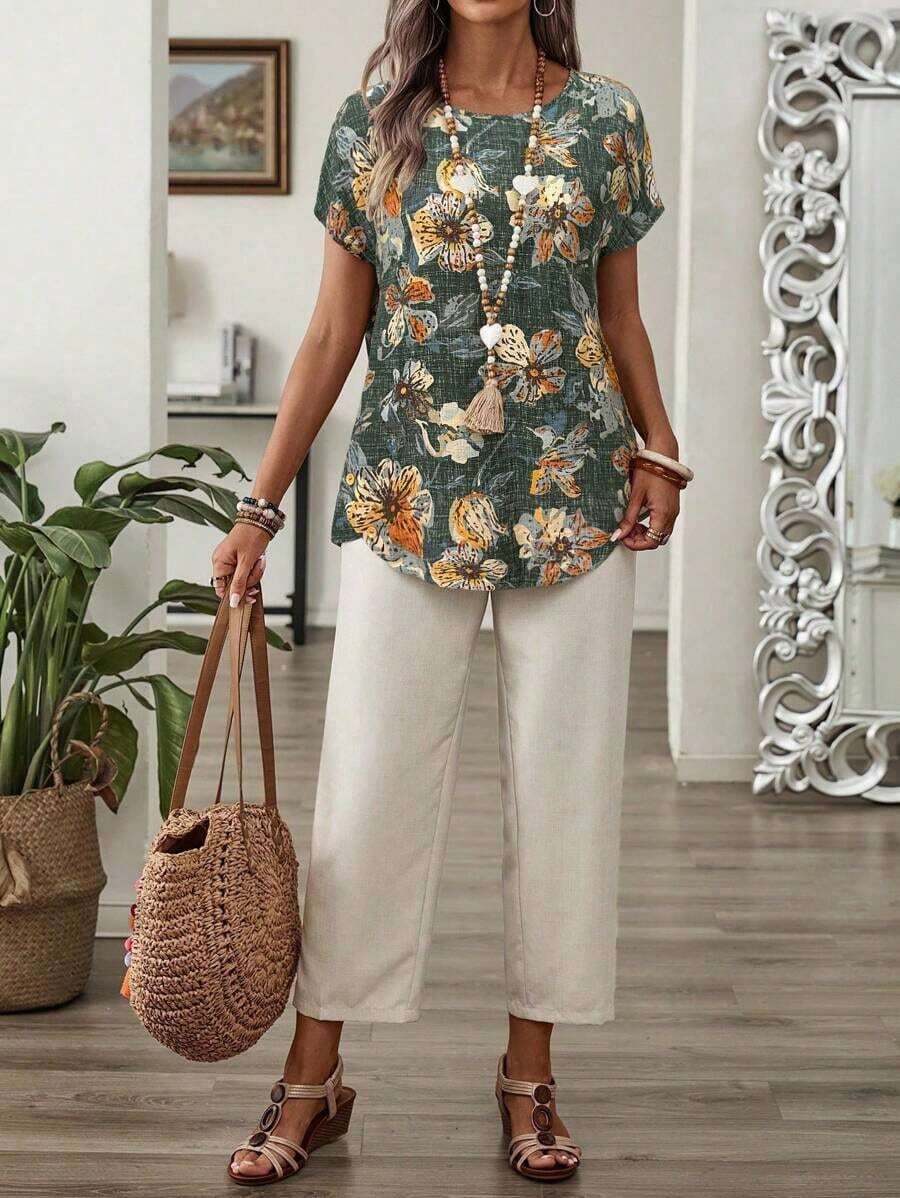 Conjunto de dos piezas para vacaciones casuales para mujeres con blusa con mangas murciélago estampada con flores y pantalones largos de unicolor - Verde - Ver 1
