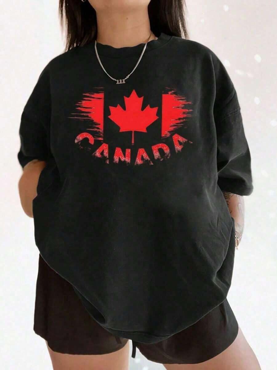 Distressed Canadian Flag Graphic Tee For Patriotic Styles, Perfect For Canada Day Celebrations And National Events. 100% Cotton. Great For Gifting. Women's Tee. Stylish. Bohemian Style. Soft, Breathable, And Comfortable Garment, Perfect For Spring, Summer, And Fall; Ideal For Vacations, Travel, And Everyday Wear. Perfect For Watching A Game. - 黑色 - 查看 1