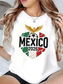Águila dorada sobre un corazón con los colores verdes blancos y rojos de México símbolo de orgullo nacional y pasión futbolera con el número 2026 al centro camiseta de mujer casual patriótica cómoda y moderna - Negro - Ver 6