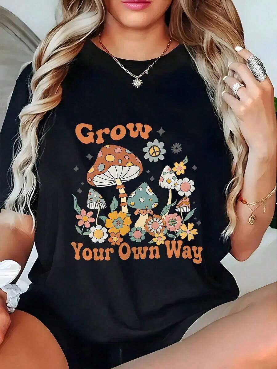 Under The RadarCamiseta de Mujer 100% Algodón Crecen a Tu Manera Estampado de Hongos y Flores - Cuello Redondo, Manga Corta, Ajuste Relajado, Transpirable para Todas las Estaciones, Lavable a Máquina, Regalo Ideal, Diseño Inspirado en la Naturaleza, Tejido Cómodo, Ropa Casual, Material Ligero, Camiseta Gráfica, Para Uso Diario 100% Algodón-Vintage Street Style Unisex Loose Cotton Short Sleeve Crew Neck T-Shirt - Negro - Ver 1