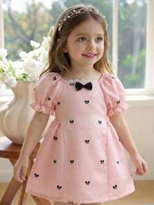 Đầm công chúa mini tối giản cho bé gái, cổ bèo nhún, tay áo cánh hoa, in hình nơ, thích hợp cho mùa hè. - Hồng - Xem 1