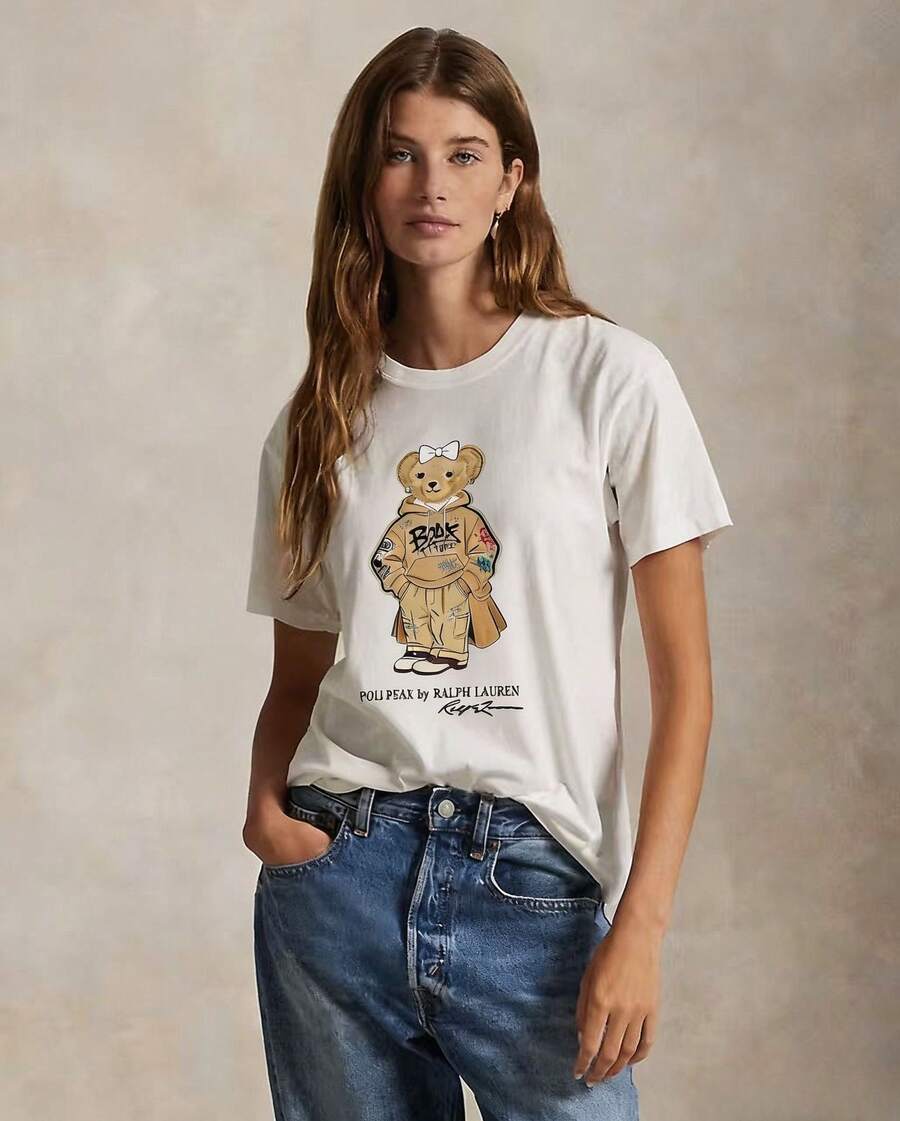 Camiseta de manga corta casual con estampado de oso para mujer, estilo europeo y americano, nueva colección de verano 2026, cómoda y holgada, camisetas a la moda. - Blanco - Ver 1
