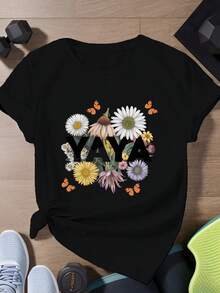 Camiseta deportiva de manga corta para mujer con la palabra YAYA y un estampado floral.una camiseta estampada muy distintiva / estilo unisex / adecuada tanto para hombres como para mujeres / resistente a las arrugas / transpirable - Negro - Ver 1