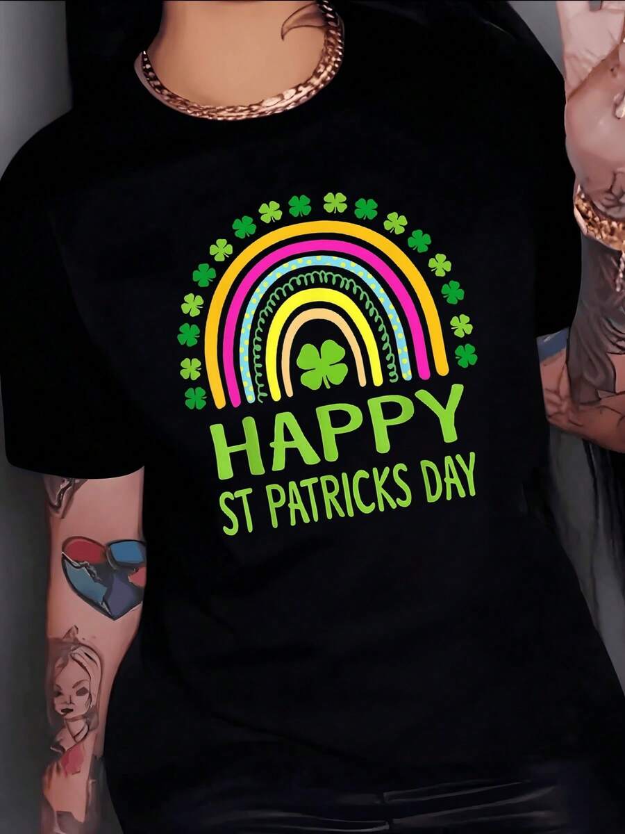 Arco iris colorido rodeado de tréboles que simboliza suerte alegría y energía positiva para celebrar el día de San Patricio camiseta de mujer casual moderna y cómoda para fiesta festiva - Negro - Ver 1