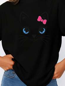 Camiseta de mujer, estampado de gatito adorable y lazo rosa - top casual de manga corta y cuello redondo, camisa transpirable para primavera/verano, diseño de cara de gato con lazo rosa, adecuada para uso casual (lavable a máquina). - Negro - Ver 3