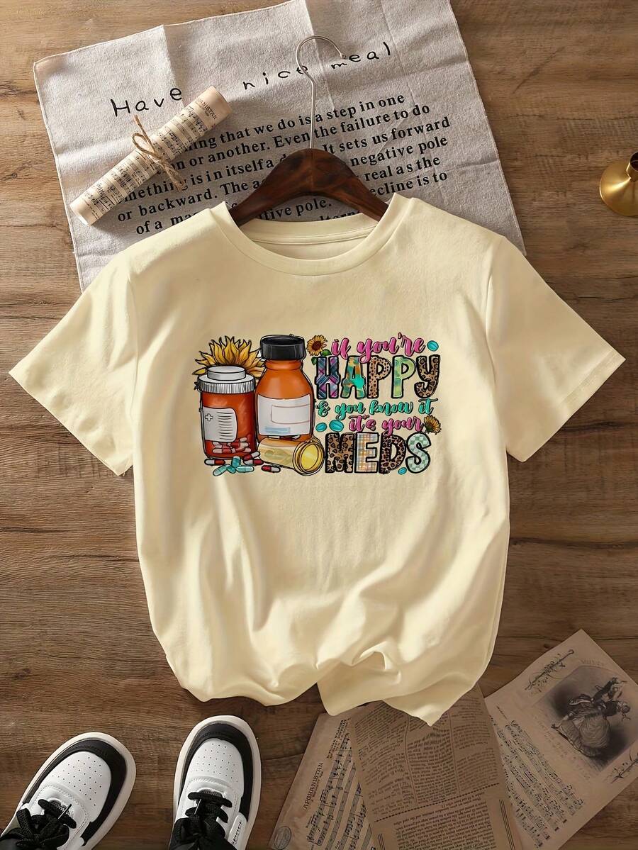 Camiseta de corte regular para mujer con estampado "Happy Meds" - Mangas cortas, cuello redondo, top casual de verano, con diseños divertidos de medicamentos y vitaminas, mezcla de poliéster ligera, adecuada para primavera y verano, ropa casual relajada. | Camiseta con Estampado Divertido | Estampado de patrones medicinales, atuendo casual diario de verano - Albaricoque - Ver 1