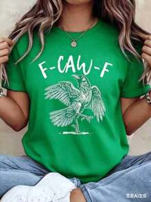 Camiseta de manga corta informal para mujer, ideal para vacaciones de verano, con un estampado de cuervo y el texto "F-CAW-F" - Ropa casual para mujer. Camiseta con Estampado de Cuervo - Camiseta Casual de Verano con un Atrevido Estampado Negro, Perfecta para Actividades al Aire Libre y Uso Casual. Ropa Deportiva para Exteriores |       Camiseta con Estampado Atrevido | Ajuste cómodo, camiseta de mujer para uso diario y fiestas de Halloween. 220g2026, Conjuntos de Verano para Mujer, Conjuntos de Vacaciones para Mujer, Ropa de Verano, Conjuntos de Primavera para Mujer, Blusas de Verano, Conjuntos para Festivales, Conjuntos de Pascua para Mujer - Verde - Ver 2