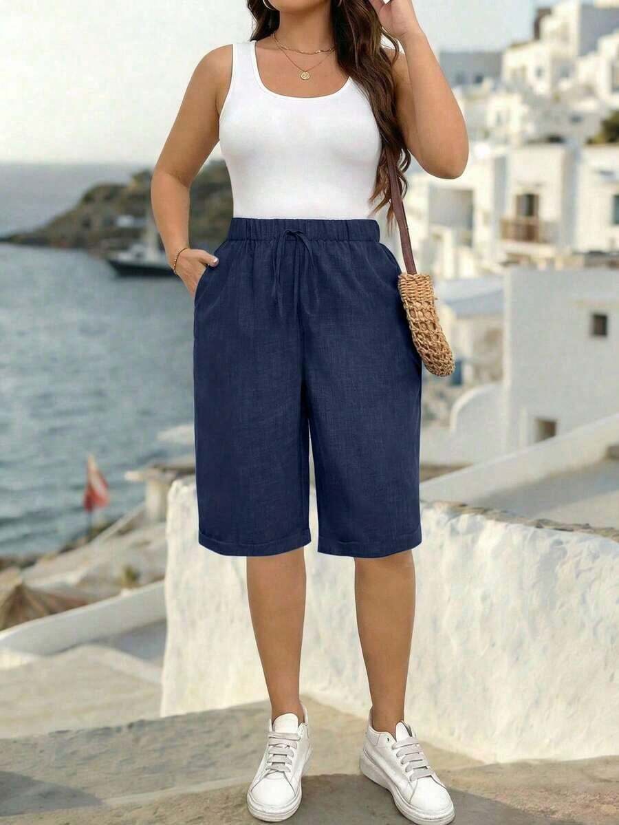 Pantalones cortos holgados de lino de talla grande para mujer, de unicolor, con bolsillo y lazo en la cintura, pantalones cortos anchos y de pierna ancha, pantalones cortos modestos para vacaciones y verano, color negro - Azul marino - Ver 1
