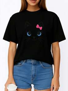 Camiseta de mujer, estampado de gatito adorable y lazo rosa - top casual de manga corta y cuello redondo, camisa transpirable para primavera/verano, diseño de cara de gato con lazo rosa, adecuada para uso casual (lavable a máquina). - Negro - Ver 1