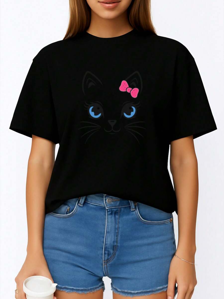 Camiseta de mujer, estampado de gatito adorable y lazo rosa - top casual de manga corta y cuello redondo, camisa transpirable para primavera/verano, diseño de cara de gato con lazo rosa, adecuada para uso casual (lavable a máquina). - Negro - Ver 1