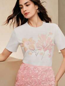 Elegante blusa de manga corta con diseño exclusivo, estampado de lentejuelas blancas, favorecedora para la figura femenina. - Negro - Ver 4