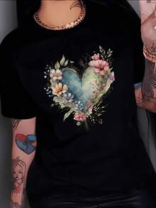 A Green Heart Surrounded By Colorful Flowers Symbolizing Love, Nature, And Hope, Connecting The Soul's Energy With The Beauty Of Life. A Comfortable, Modern, Casual Women's T-Shirt. - 黑色 - 查看 8