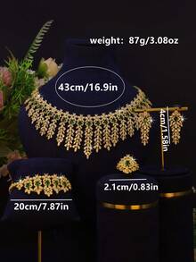 Bộ trang sức cưới 5 món mạ vàng 18K sang trọng kiểu hoàng gia, thiết kế tua rua hình học, đính đá Cubic Zirconia xanh lá cây thủ công, bao gồm dây chuyền, vòng tay, bông tai và nhẫn, thích hợp đeo hàng ngày và làm quà tặng cưới, kỷ niệm ngày cưới (kèm hộp quà cao cấp). - Thiết kế tua rua hình học - Xem 3