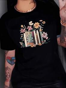 Libros antiguos junto a flores silvestres que simbolizan crecimiento conocimiento y belleza natural en armonía con el alma femenina camiseta de mujer casual cómoda para uso diario - Negro - Ver 8