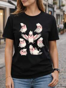 Camiseta divertida con diseño de dibujos animados de un loro rosa, regalo divertido para amantes de las aves, camiseta gráfica de loro lindo. Camiseta unisex de algodón puro de 220 g, peso ideal para todas las estaciones, adecuada tanto para hombres como para mujeres. Tejido duradero de alta calidad, suave al tacto y de larga duración. Parte superior transpirable, adecuada para el uso de otoño y vacaciones de las mujeres. - Negro - Ver 1